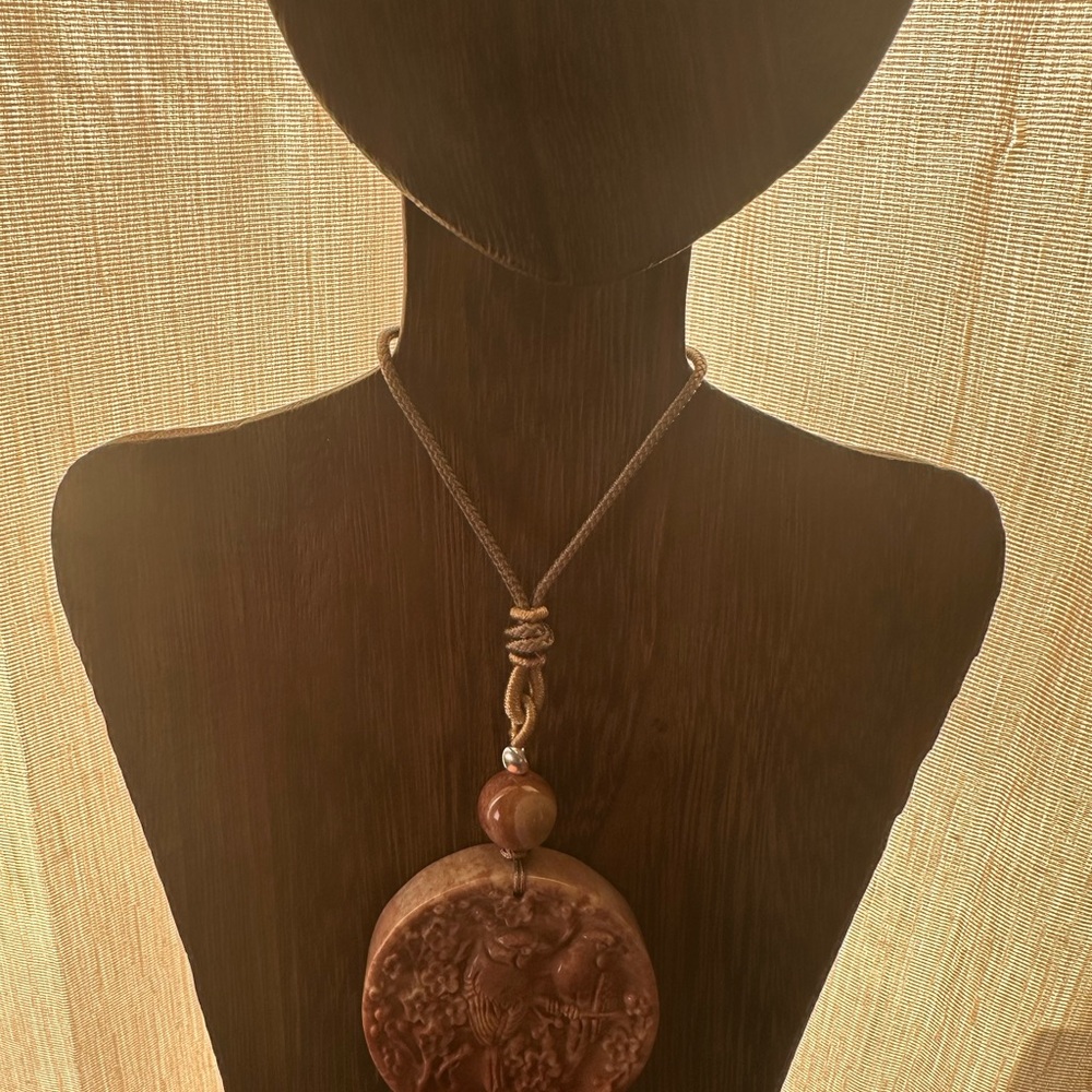 Coral Fossil Carved Round Bird Pendant Necklace on Tan Adjustable Rope - Picture 4 of 13